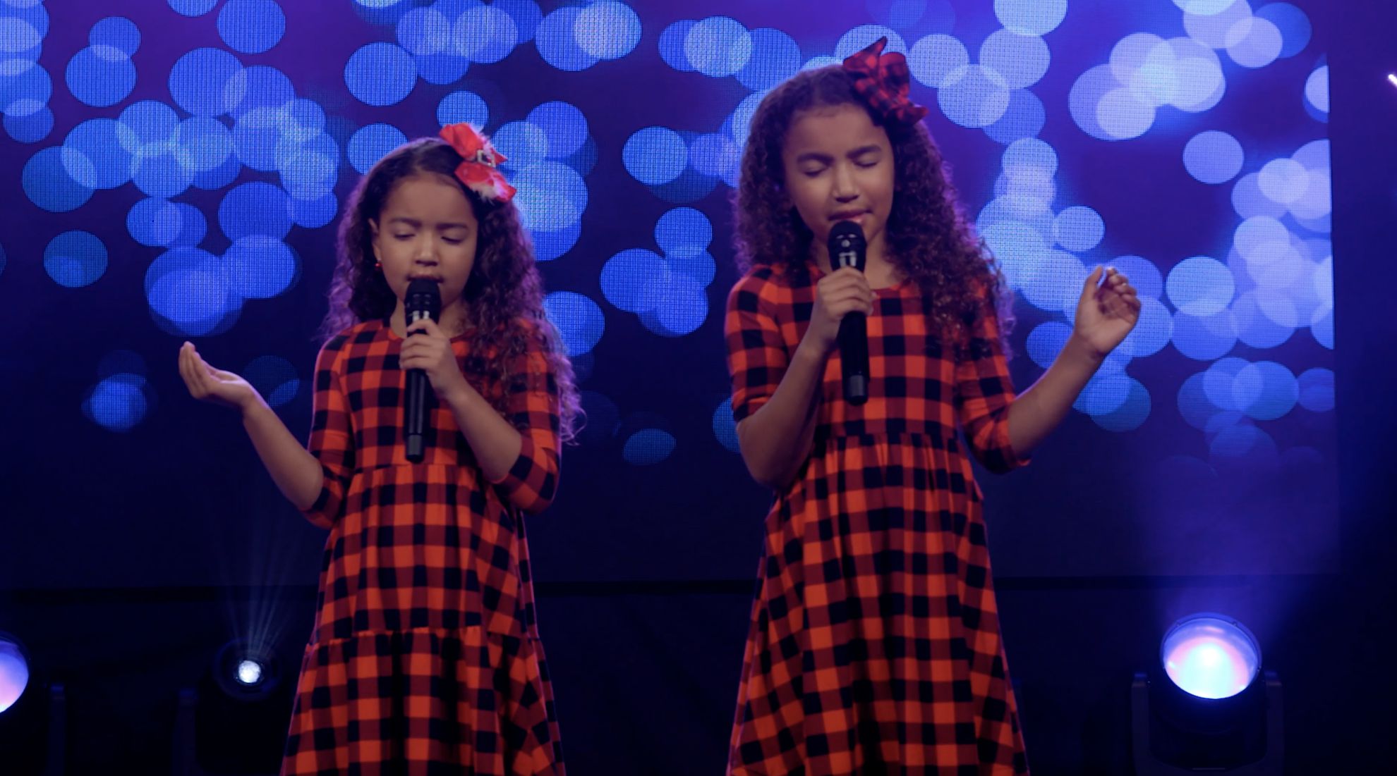 Two Girls Sing on Christmases